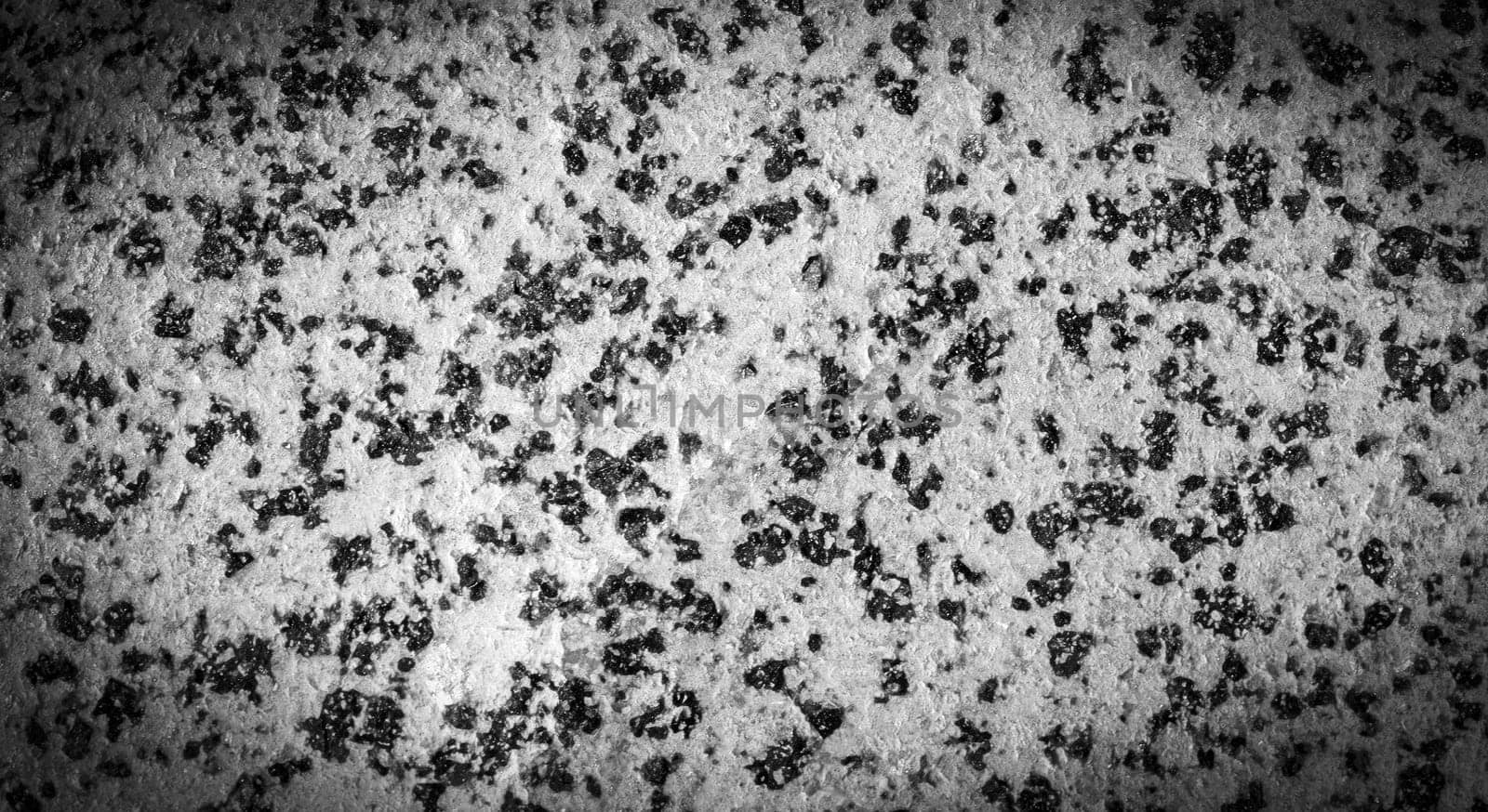 The Dark grey black stone background or texture. Selective focus