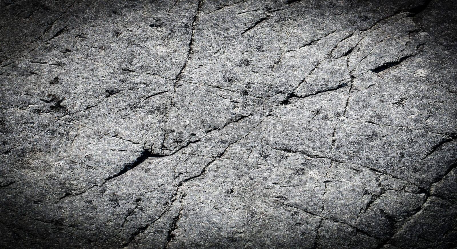 The Dark grey black stone background or texture. Selective focus