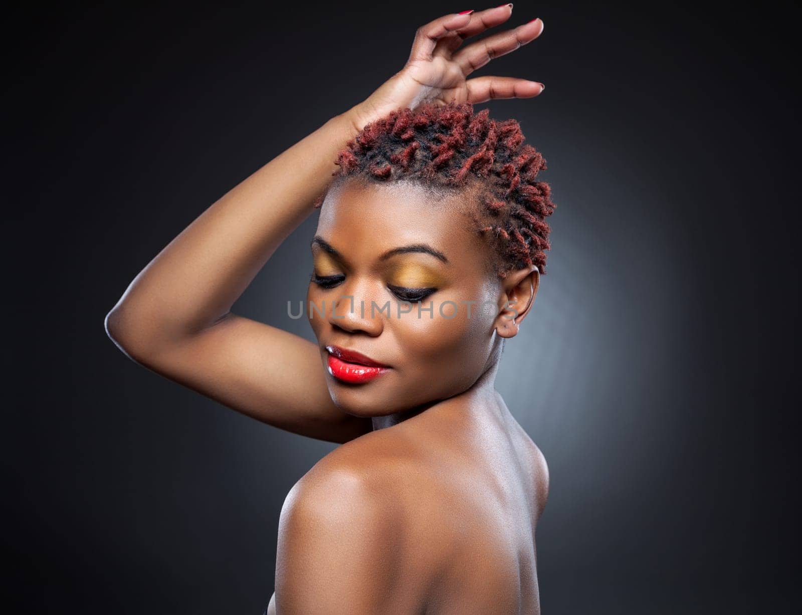 Black beauty with short spiky red hair