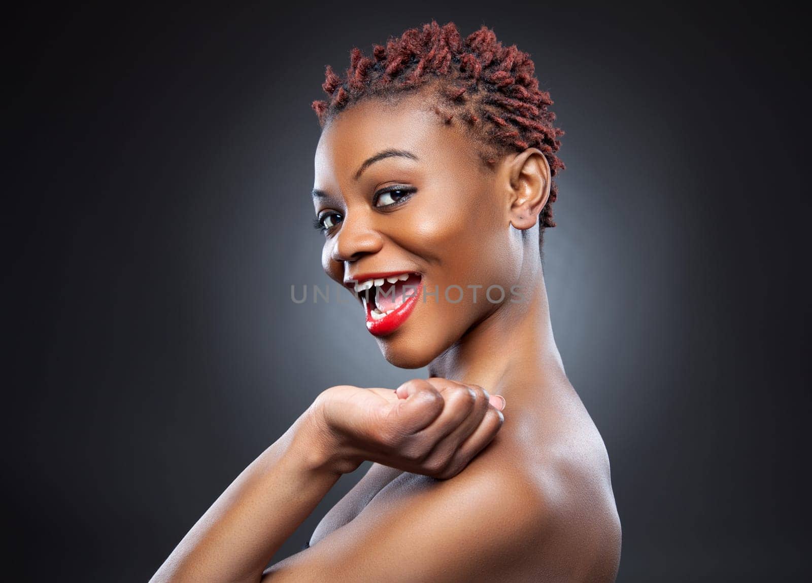 Black beauty with short spiky red hair