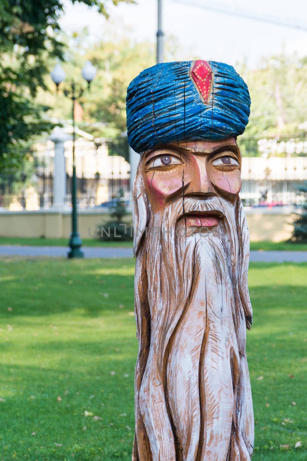 A wood sculpture in a park for fun kids