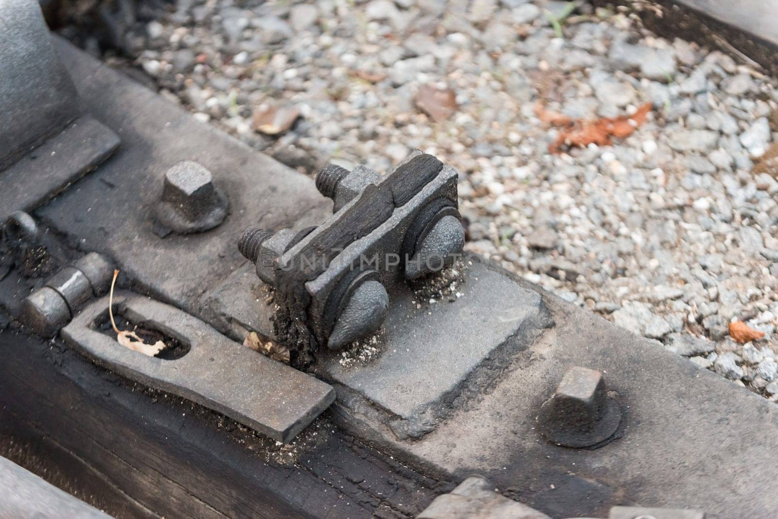 Bolts on a railway in a station in a prak