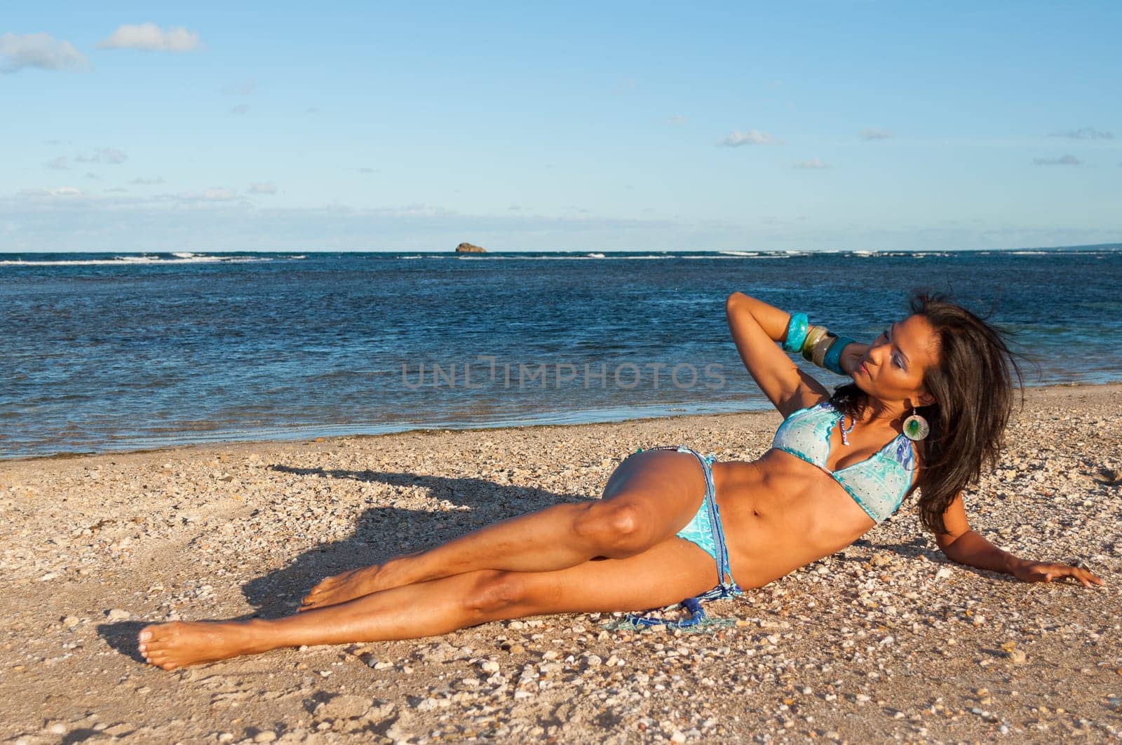 Beautiful and sexy girl posing on the beach in dominican republic