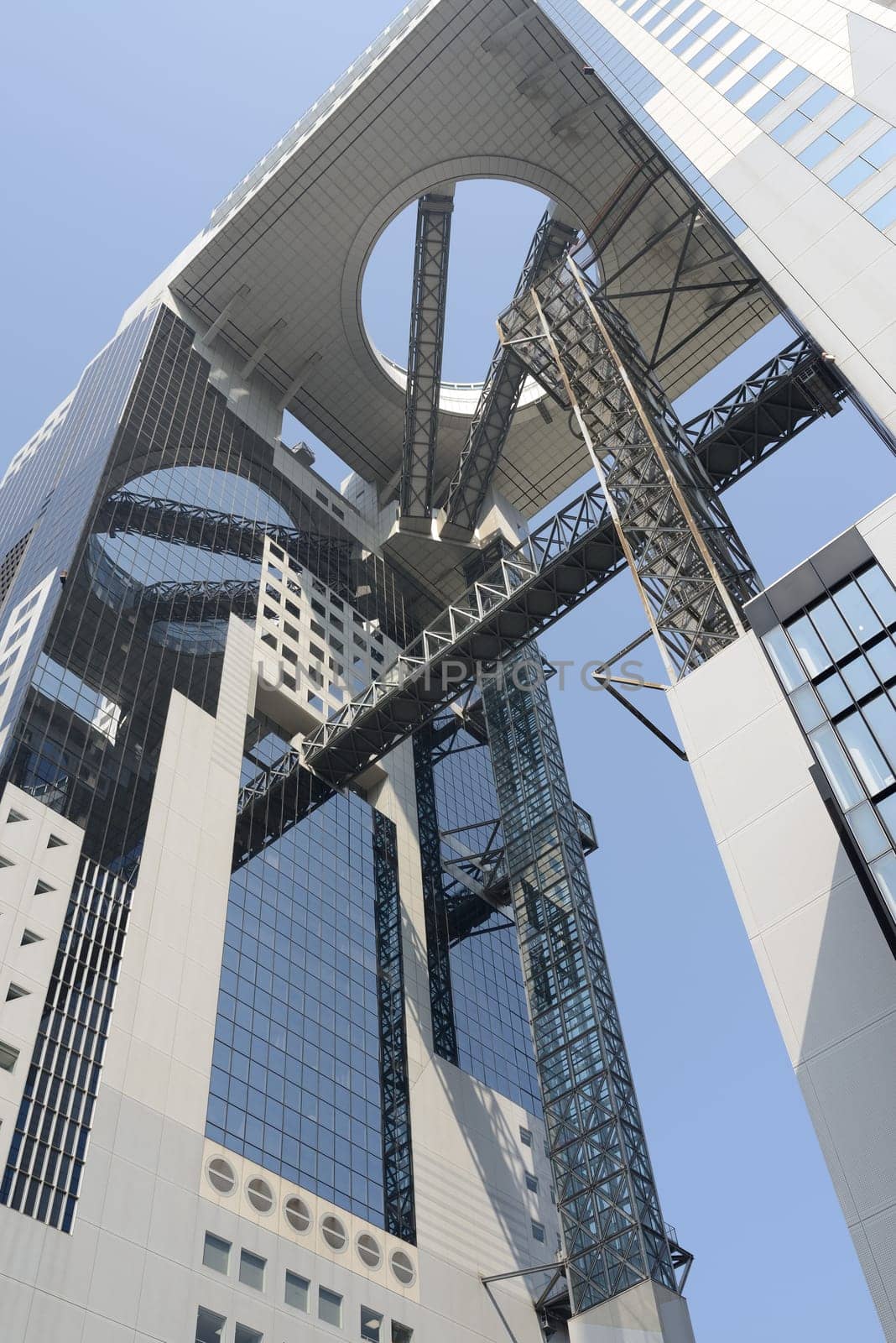 Looking up at a tall office building in Osaka Japan