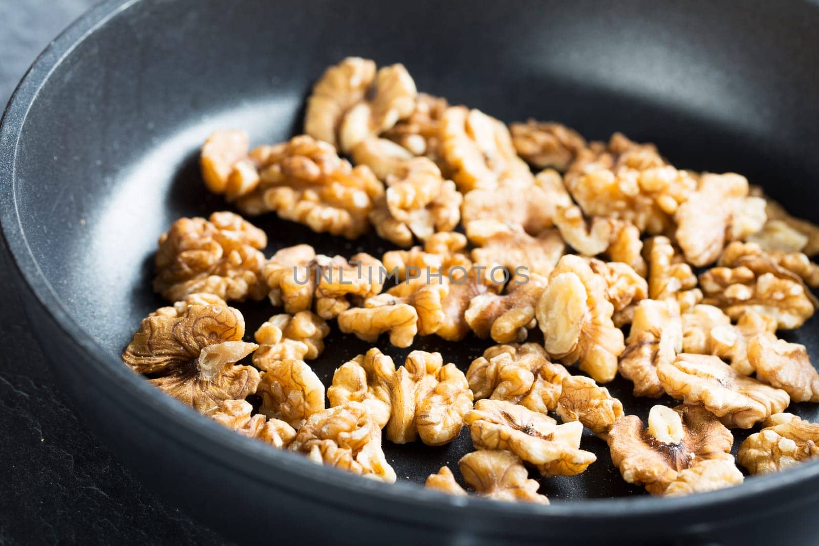 Walnuts in pan for toasting