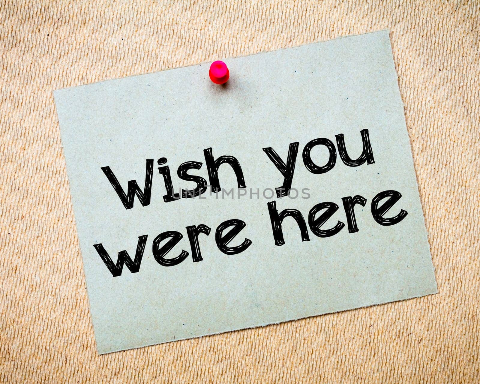 Word of mouth Message. Recycled paper note pinned on cork board. Concept Image