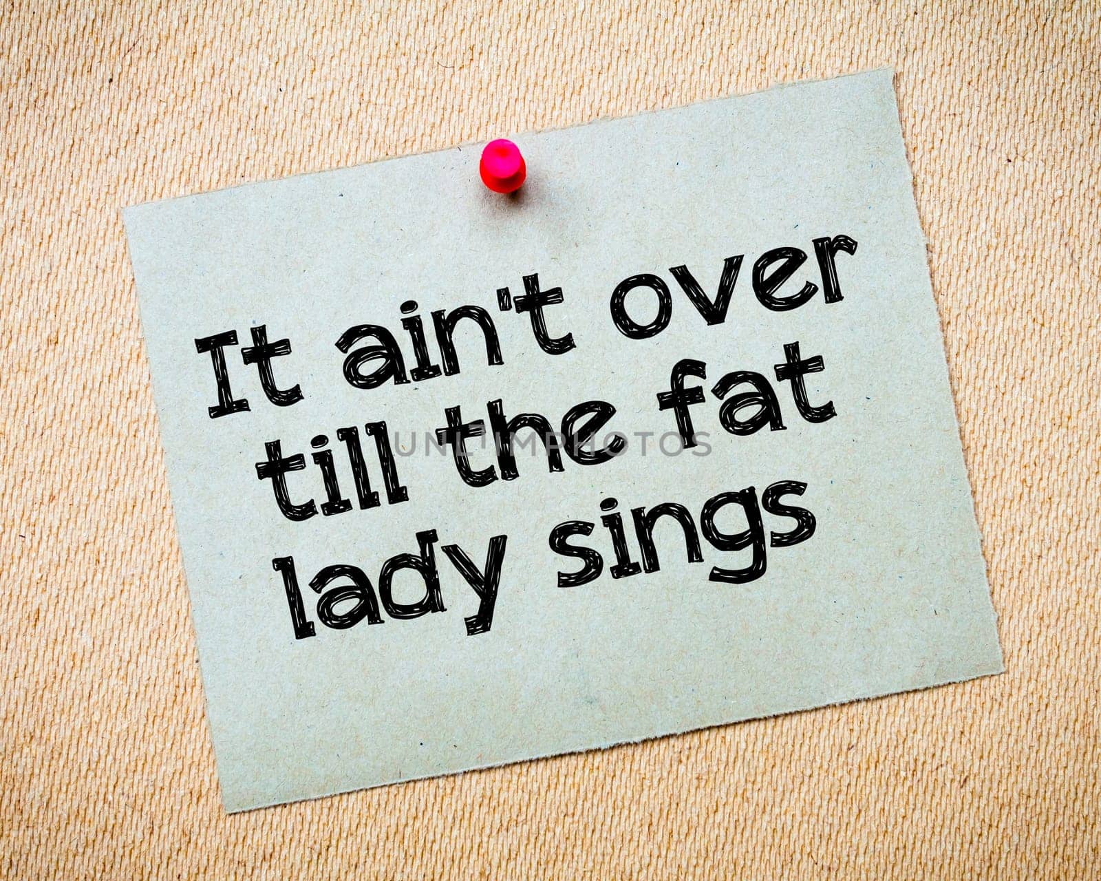 Word of mouth Message. Recycled paper note pinned on cork board. Concept Image