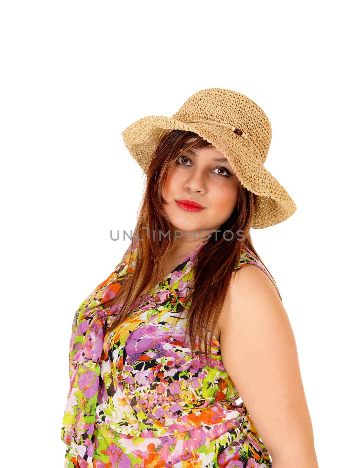 A portrait shot of a serious looking young woman wearing a straw hat and blouse.with her hand behind her head, isolated for white background..