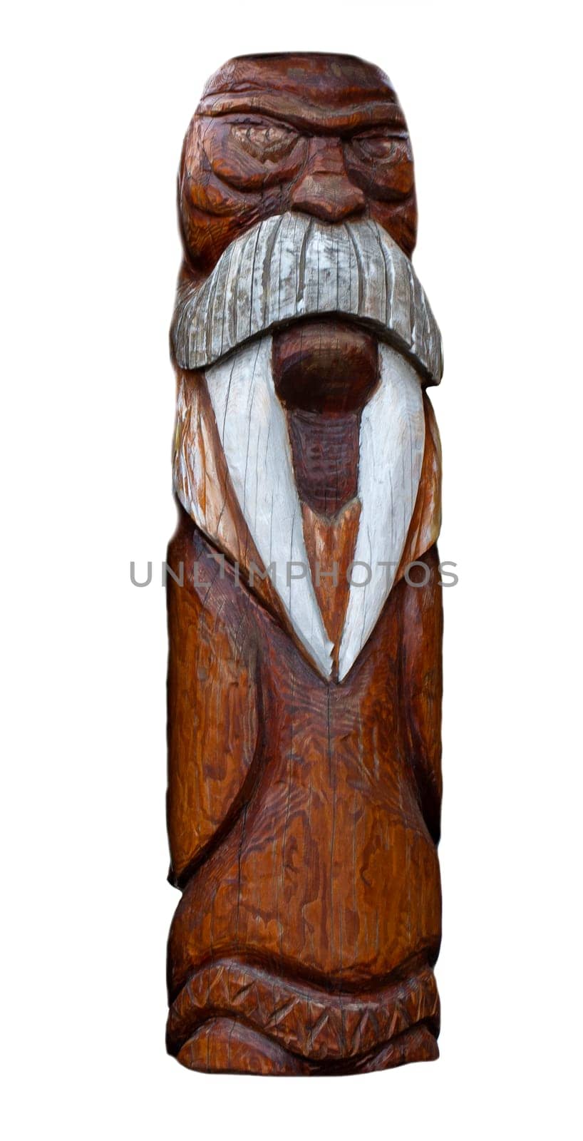 The wooden idol statue of koryak on a white background