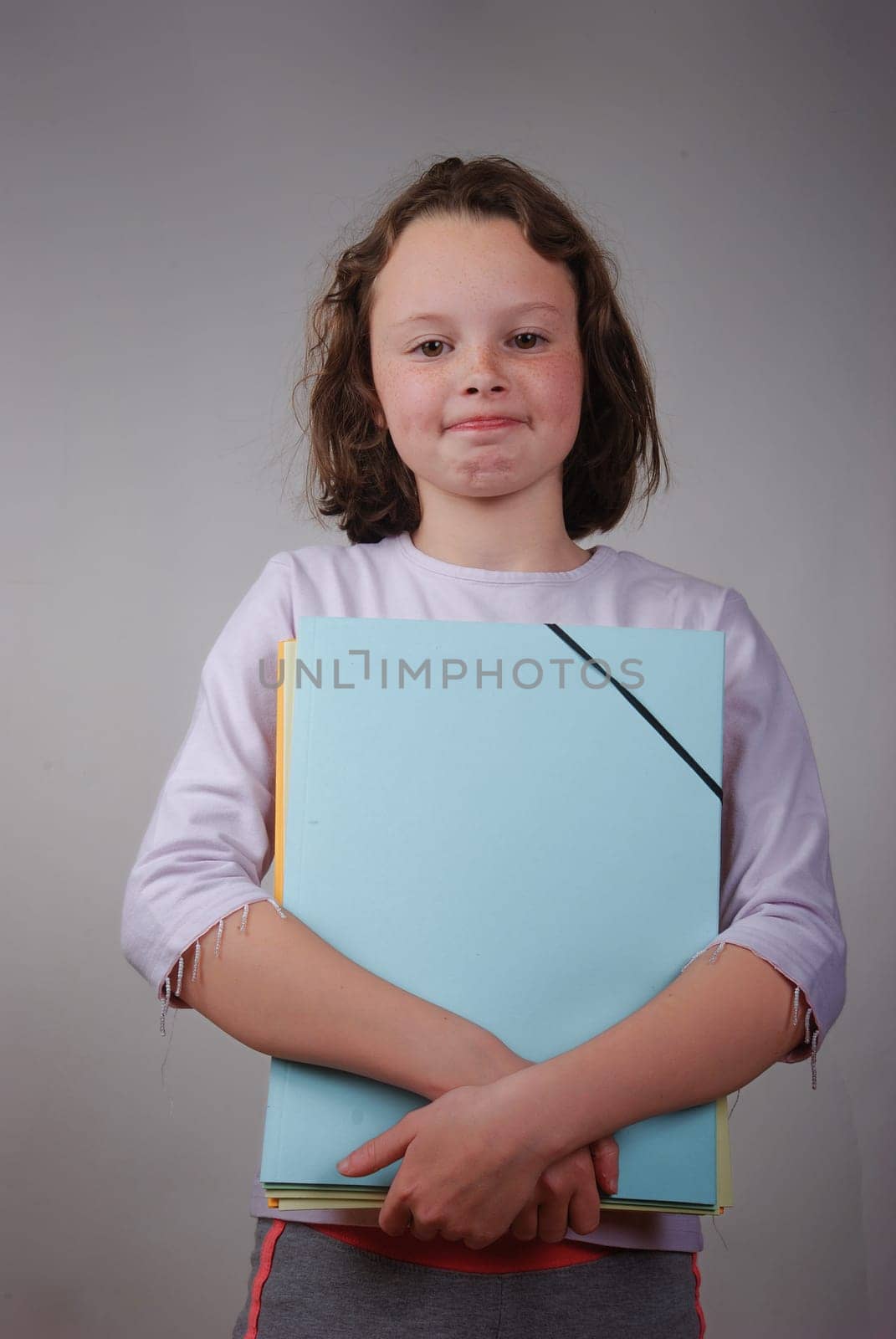 student with folder