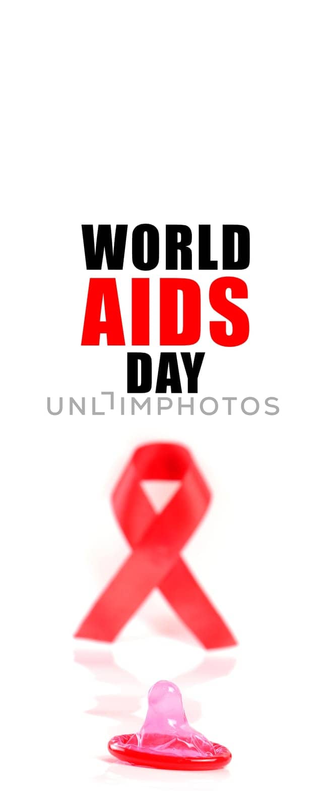 Aids ribbon and condom on white background.
