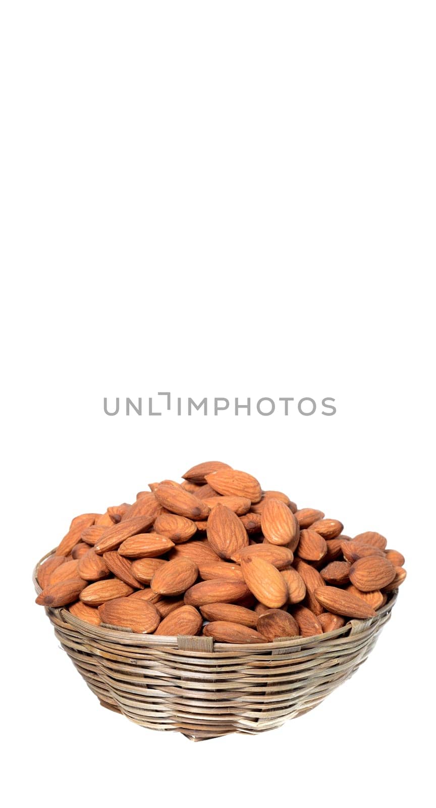 Almonds in a wooden basket with heap isolated on a white background