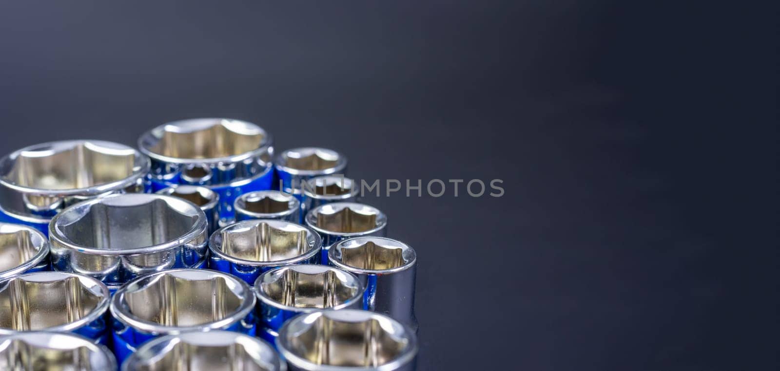 Block wrench set on a black background.