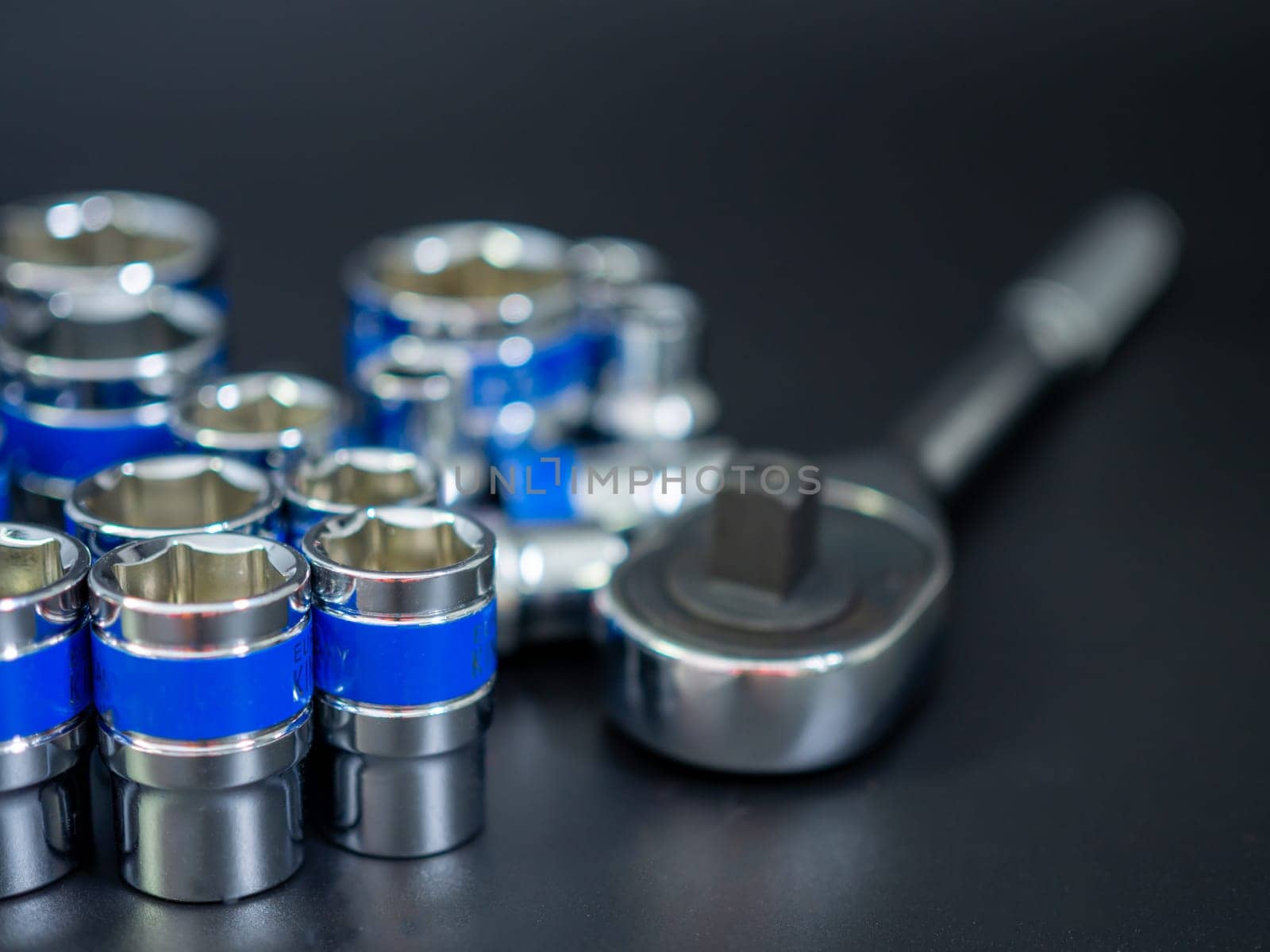 block wrench set and ratchet wrench on a black background.Block wrench set on a black background.