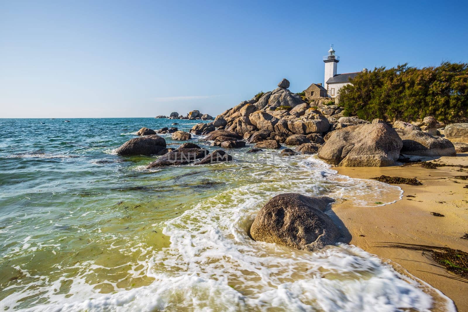 Pontusval lighthouse and the coast in Kerlouan, northern Brittany, France