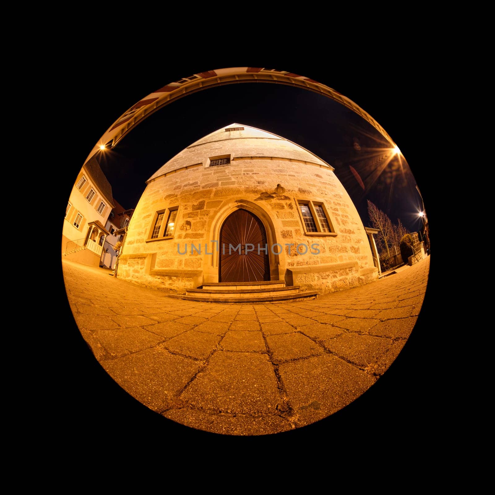 In front of a church with fish-eye-lens distortion