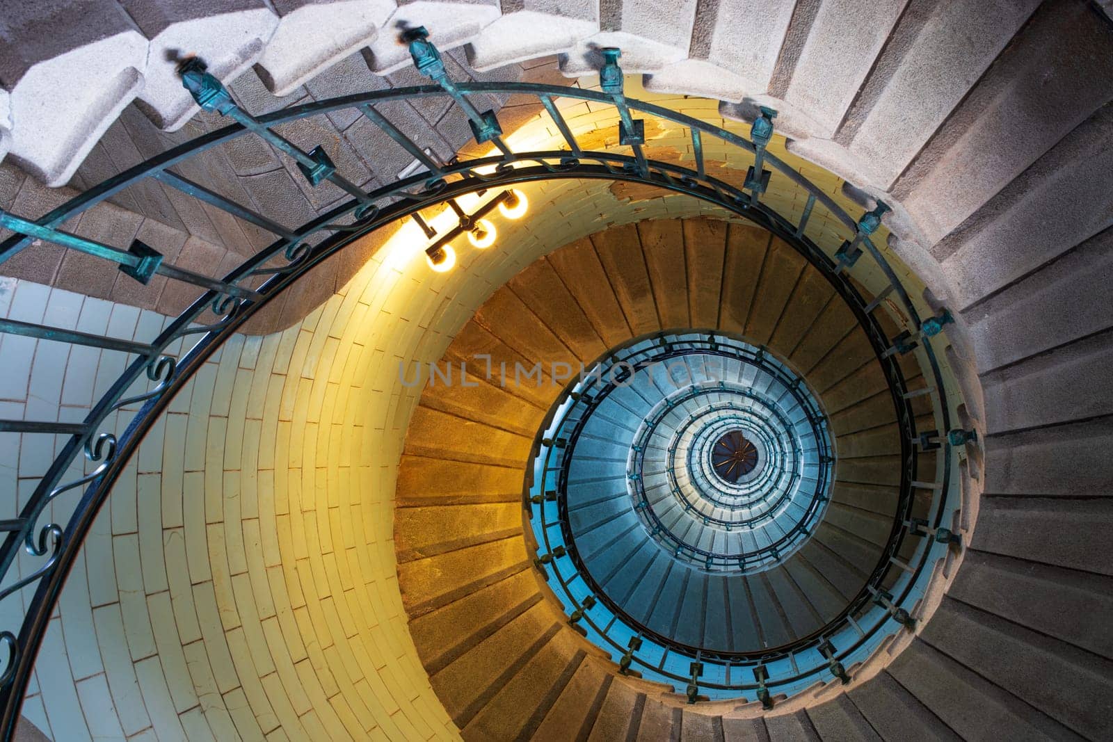 Spiral staircase inside the Eckmuhl lighthouse in Brittany, France