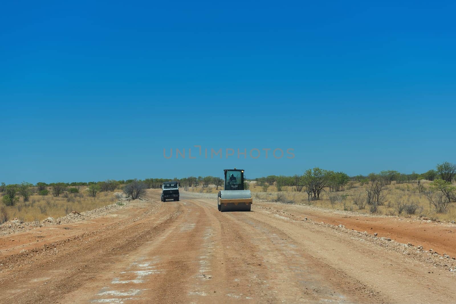 Repair work on an unpaved road in the Erongo Mountains, Namibia