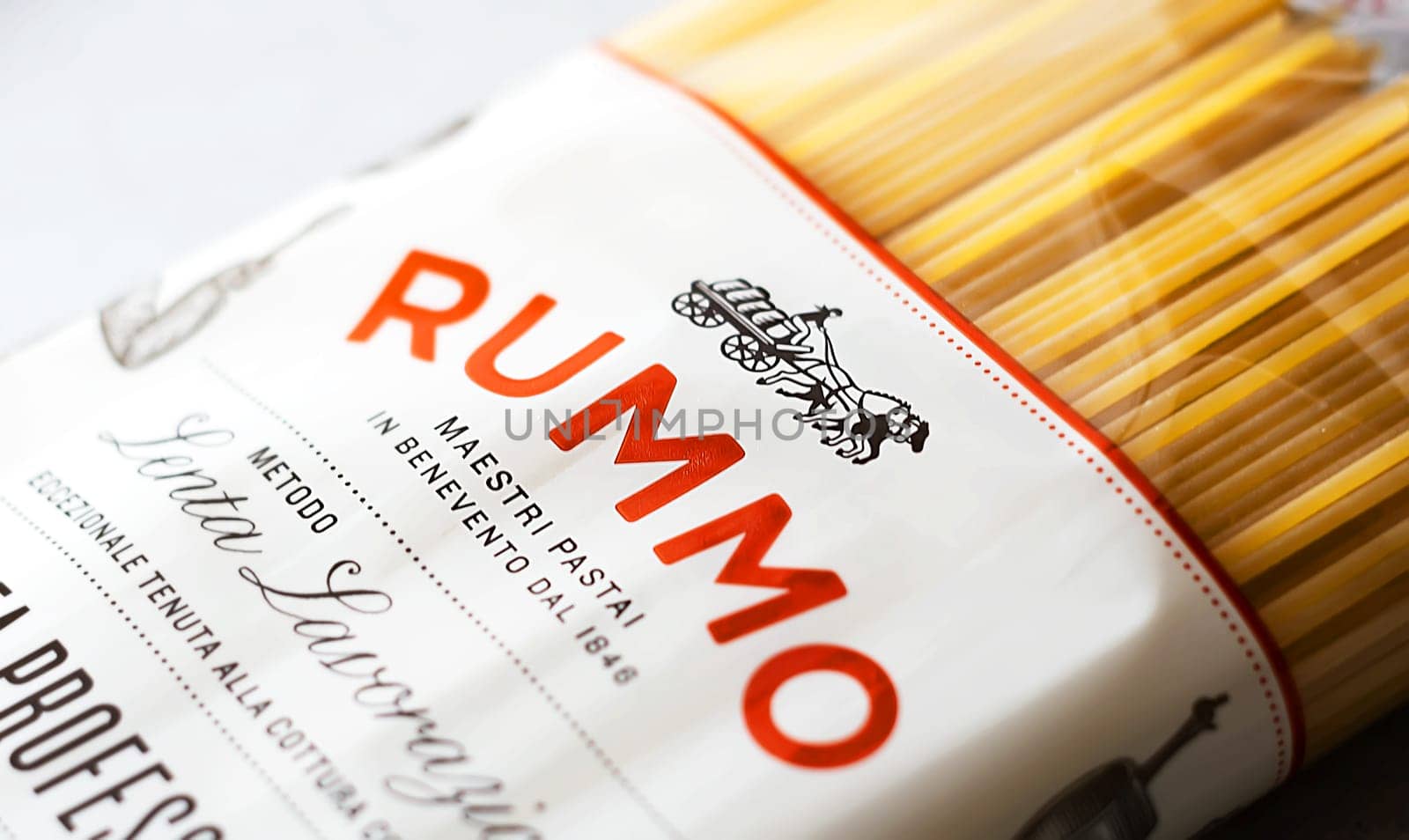 Rome, Italy, November 15th 2020: the Rummo logo printed on the transparent package of spaghetti pasta. Famous Italian brand in the pasta market. Illustrative editorial