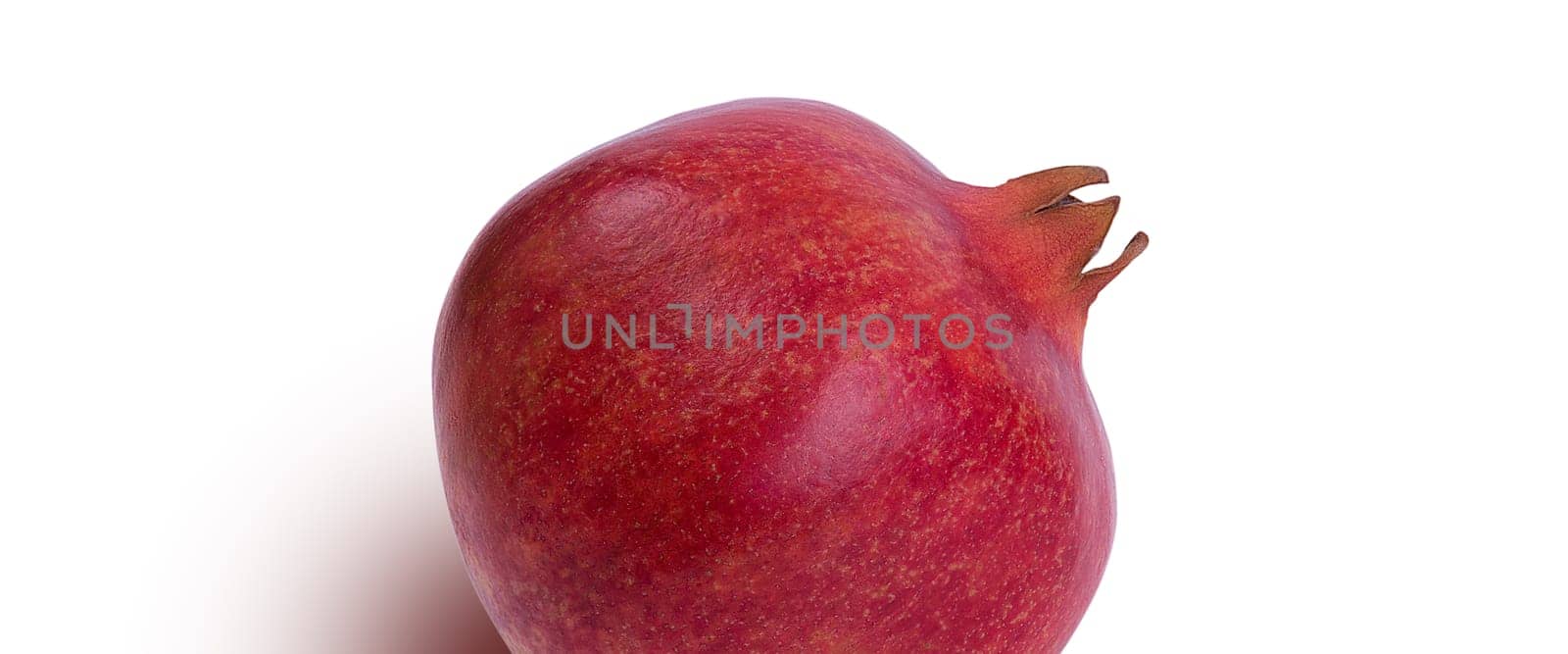 Garnet isolated on a white background close-up with shadow. Fresh pomegranate. Juicy pomegranate. Delicious pomegranate. Place for advertising, logo, lettering, layout, mockup.