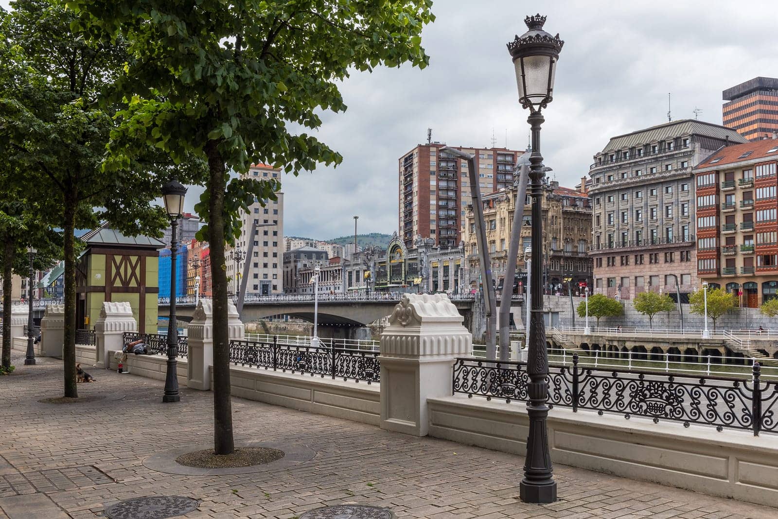 bilbao downtown with nervion river and boardwalk area, basque country, spain