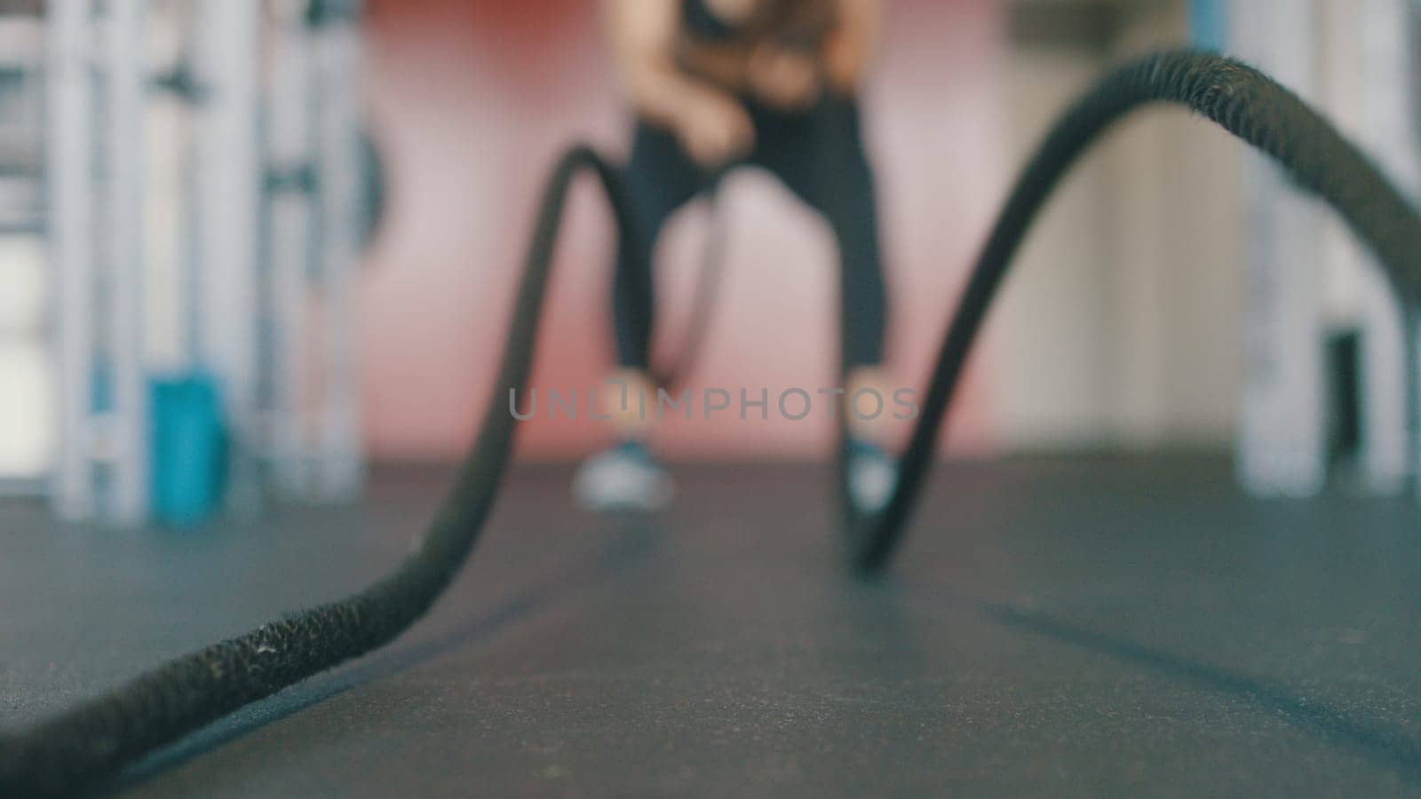 a crossfit athlete performing exercise in gym