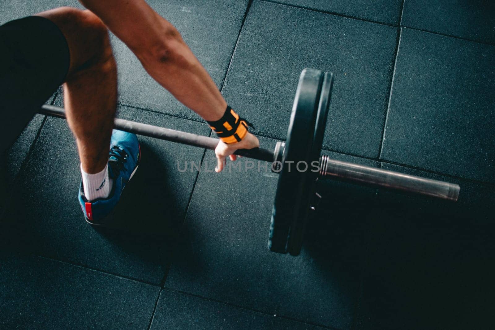 a crossfit athlete performing exercise in gym
