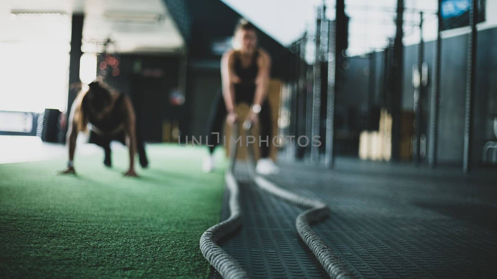 a crossfit athlete performing exercise in gym
