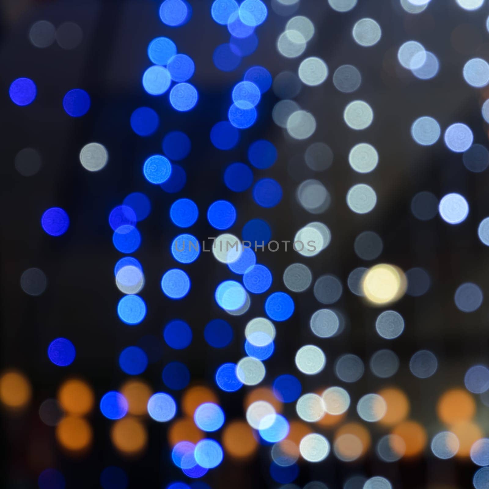 Abstract colorful bokeh background of de-focused Christmas lights