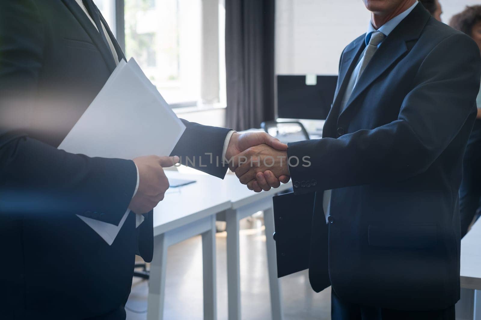 Two Unrecognizable Business Man Shake Hand Agreement Coworking Center Business Team Coworkers In Modern Office