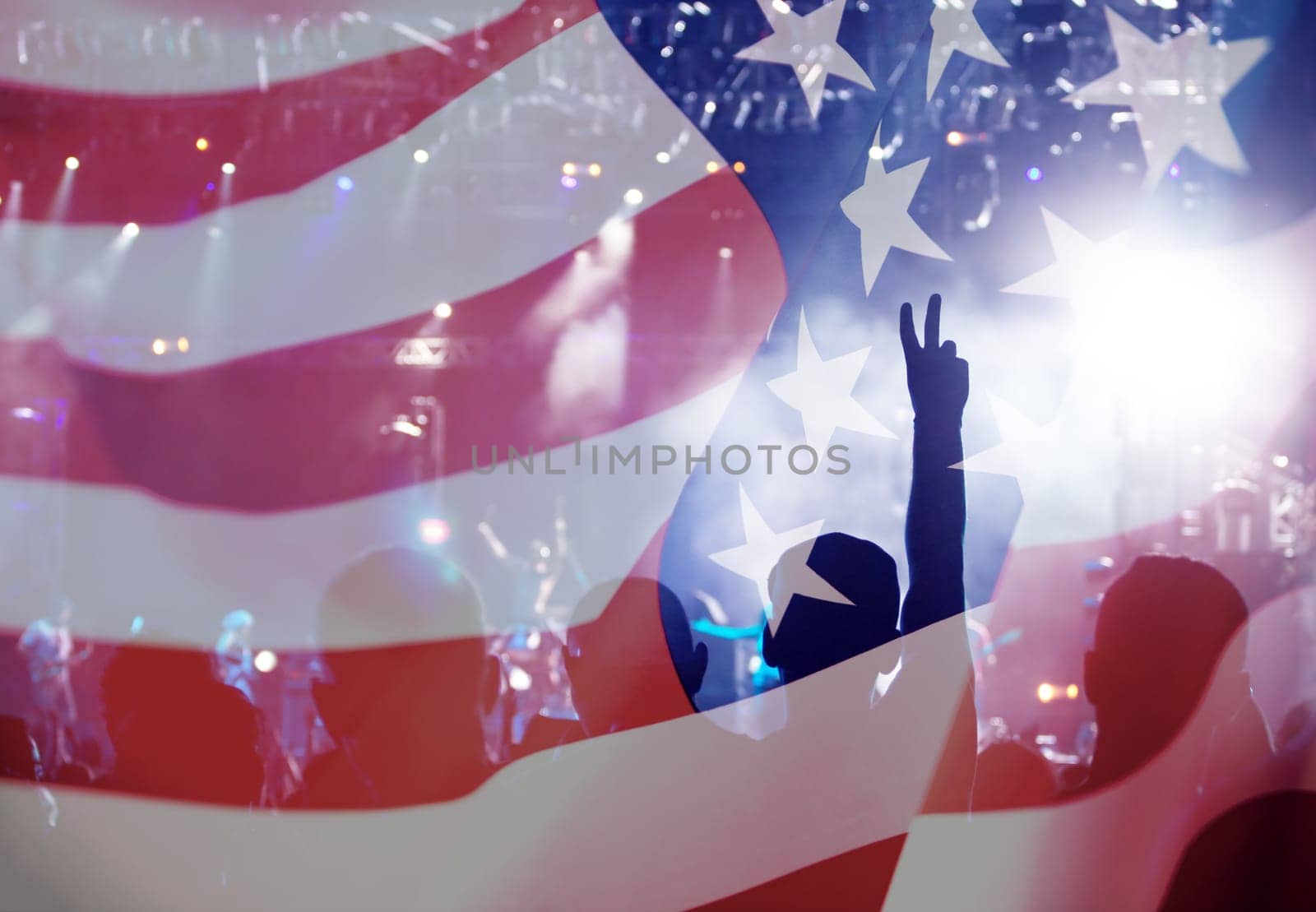 Crowd of people celebrating Independence Day. United States of America USA flag with fireworks background for 4th of July.