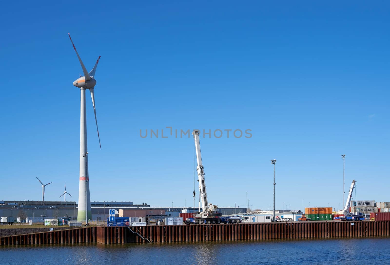 Commercial port of the city of Magdeburg in the North industrial park with a wind turbine