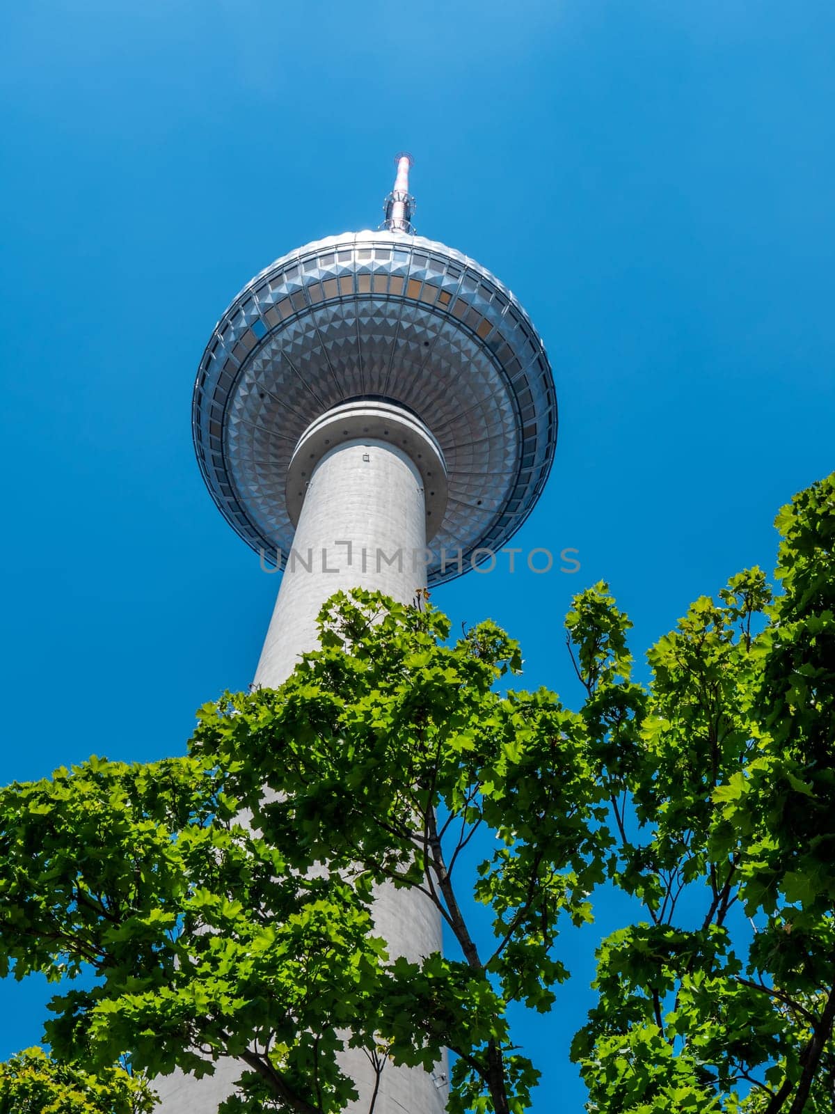 Berlin Television Tower from low angle during summer, germany