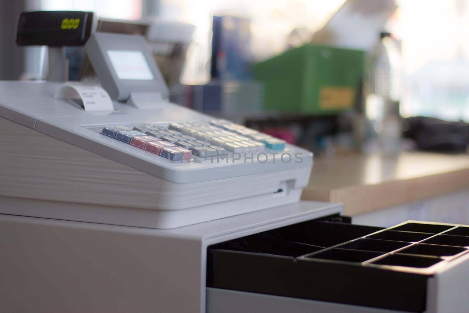 Cash register in a shop: Customer is paying purchase