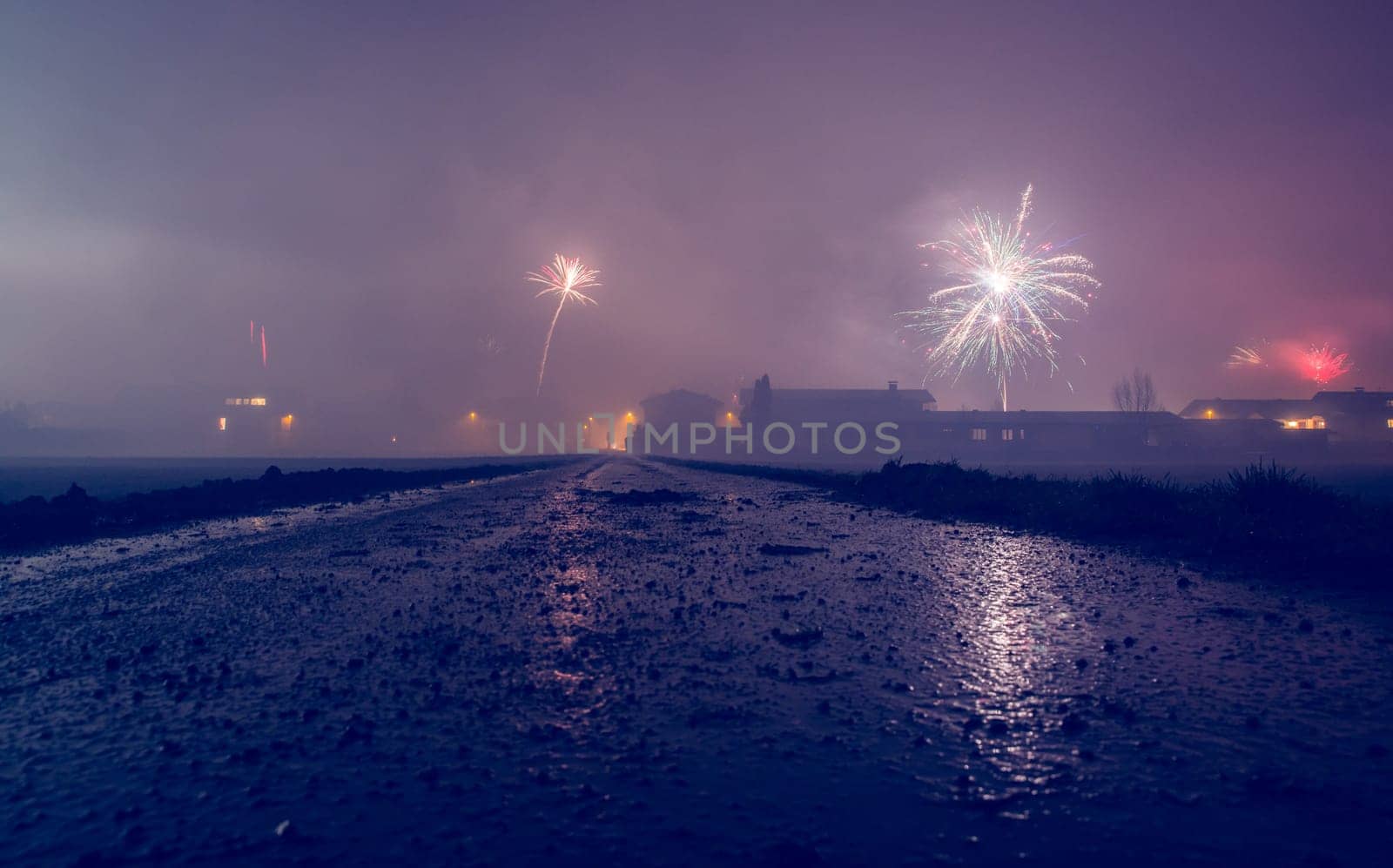 Firework at new year on a dusty wet landscape, Austria