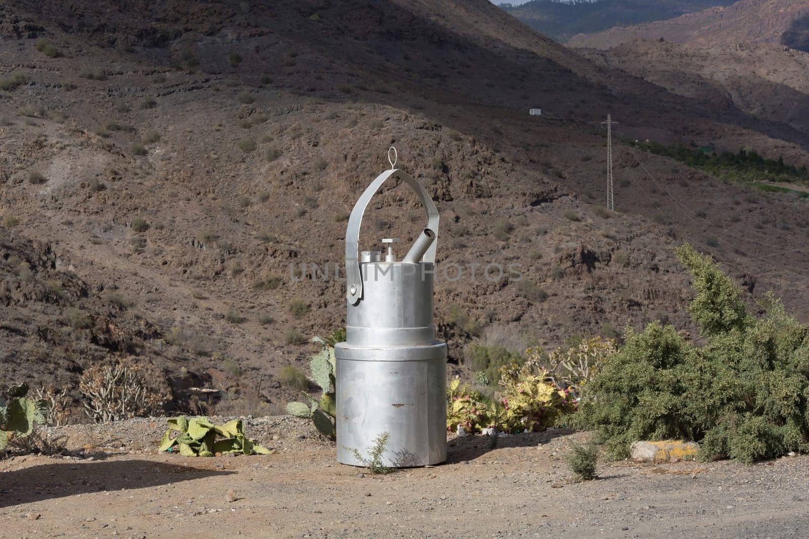 Giant blowtorch in the garden of Villa Mogan, the historic windmill Molino de Viento, Mogan, Gran Canaria, Spain