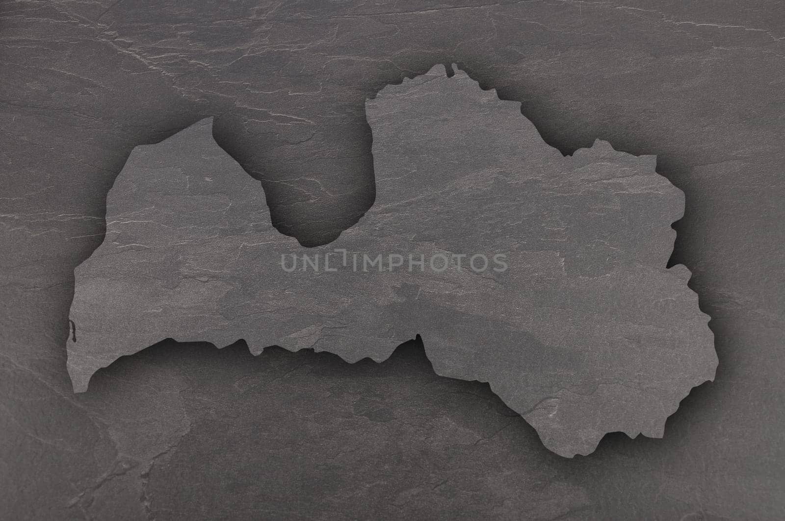 Map of Latvia on dark slate