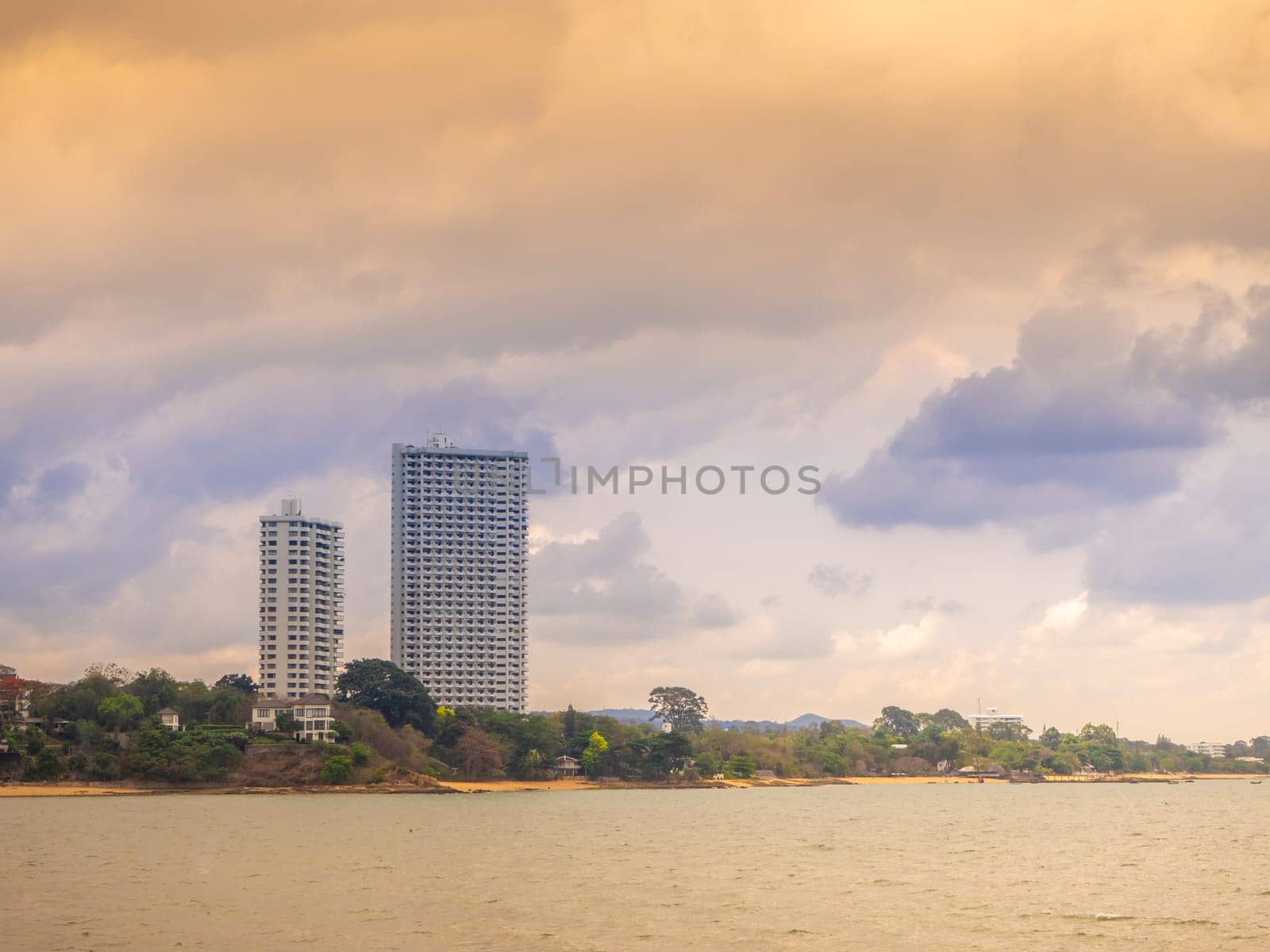 high  Building in Pattaya  Beach  and beautiful blue sea.