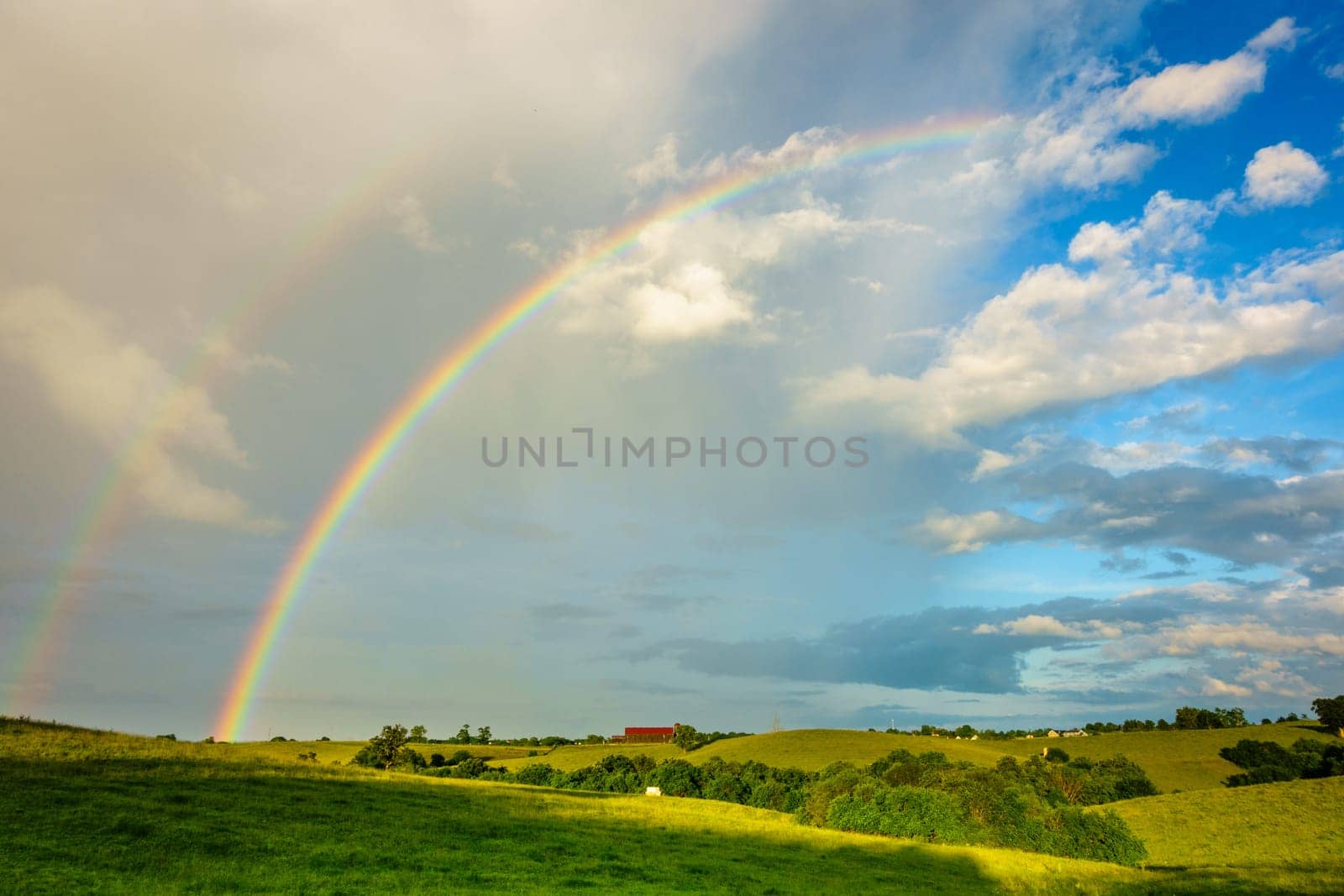 Scenic view of Central Kentucky countryside with double rainbow after storm
