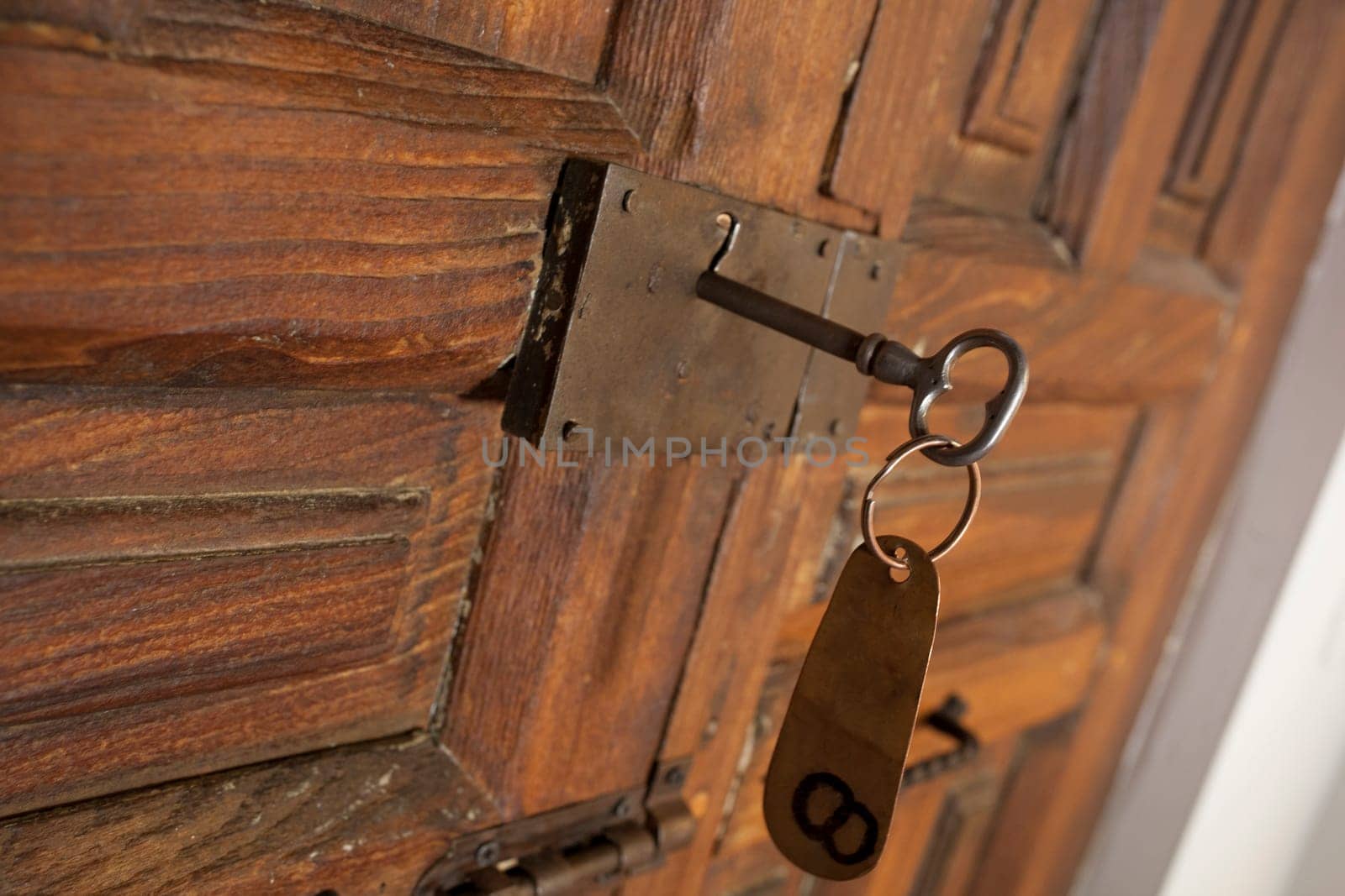 Rural room key lock with hanging tag. Rural tourism concept