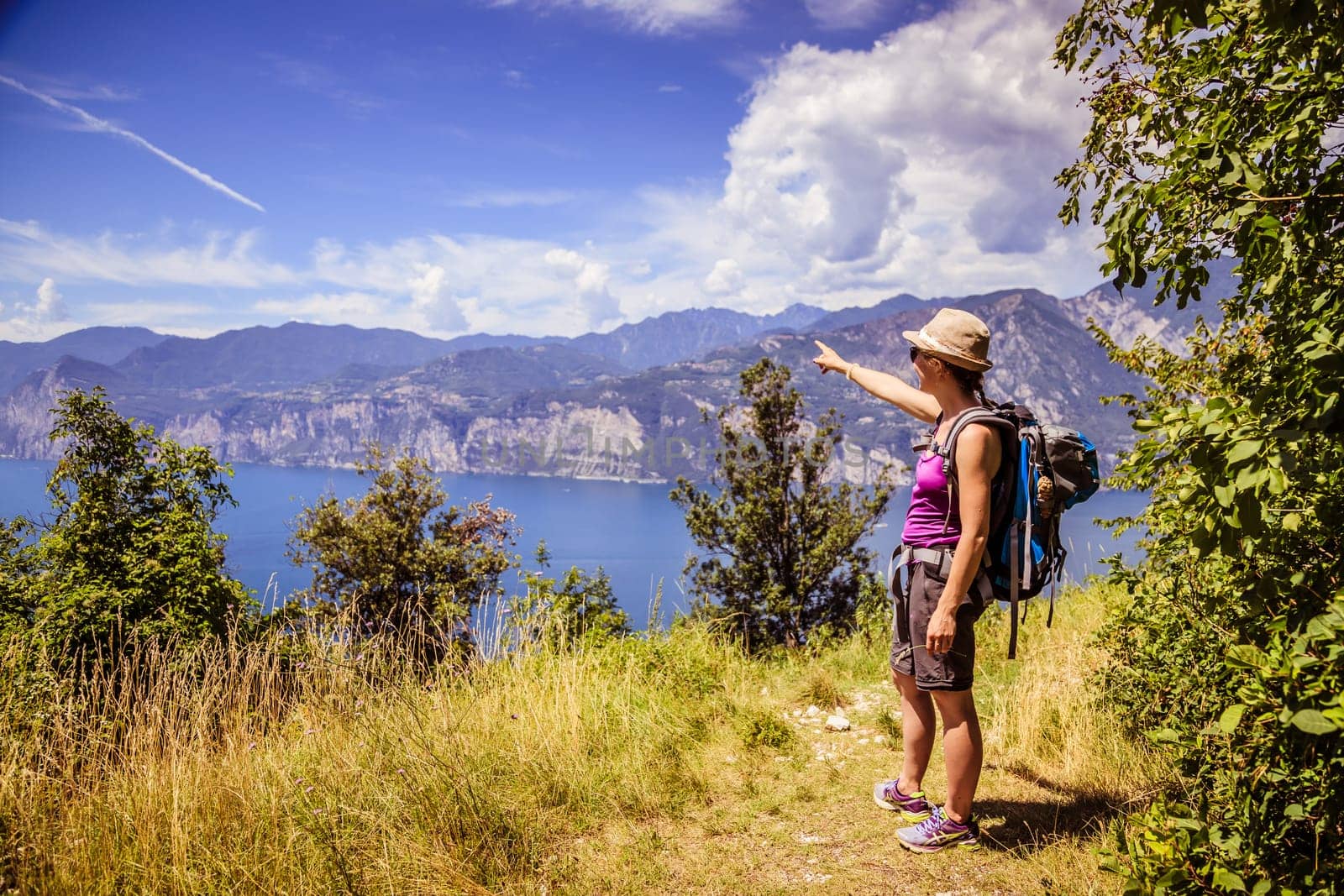 Young girl is hiking on Monte Baldo, Italy