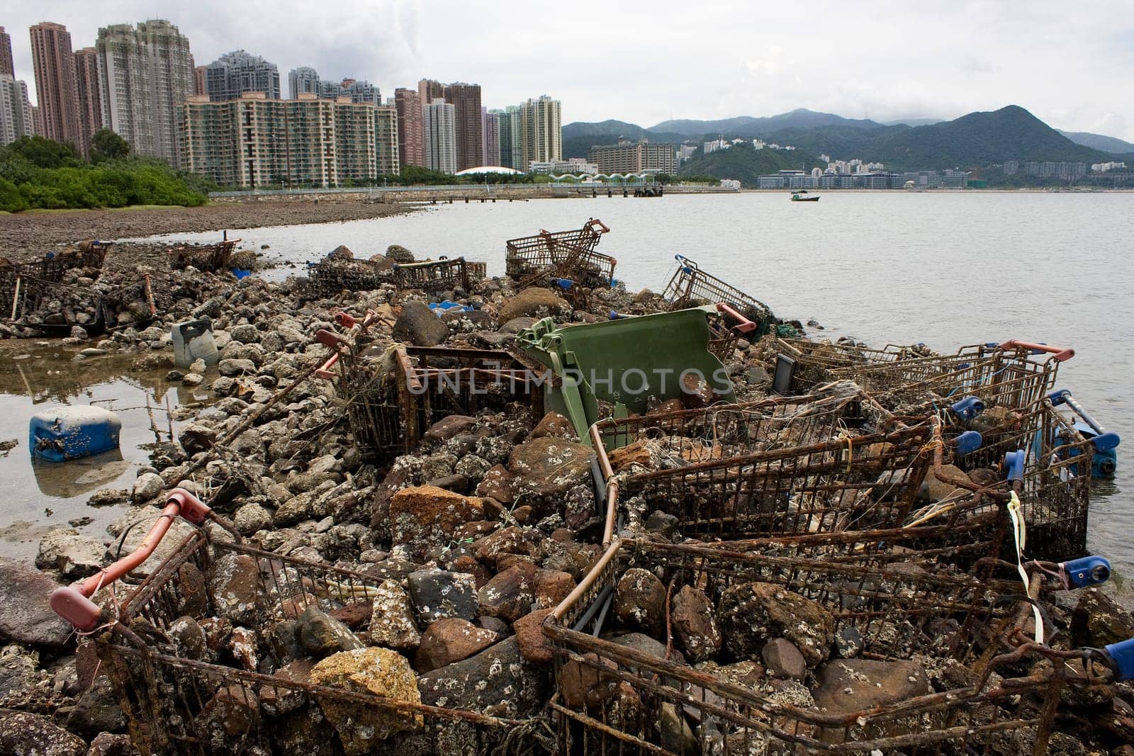 Garbage piled up on the coast of the ocean