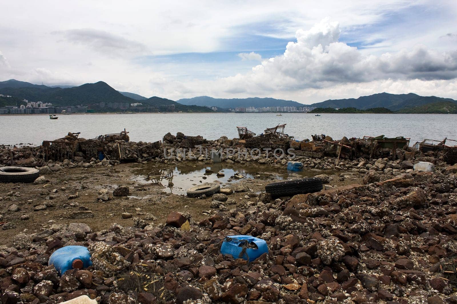 Garbage piled up on the coast of the ocean