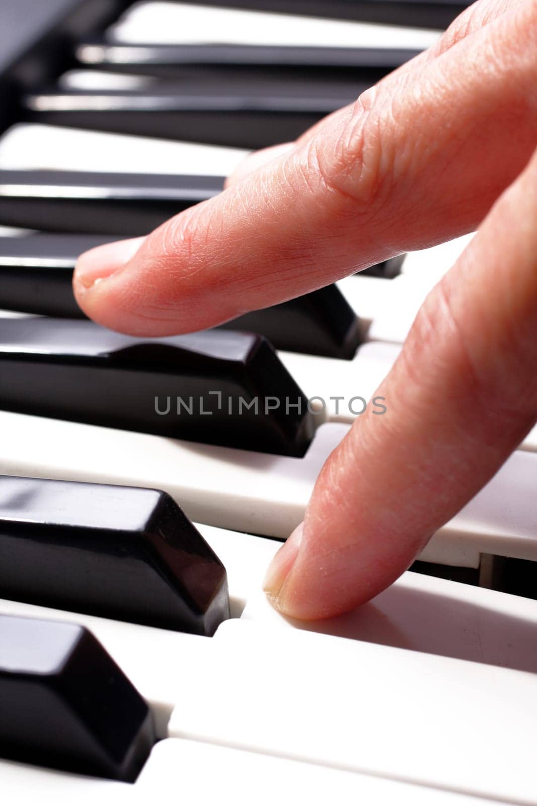 hands playing music on the piano, hands and piano player, keyboard .