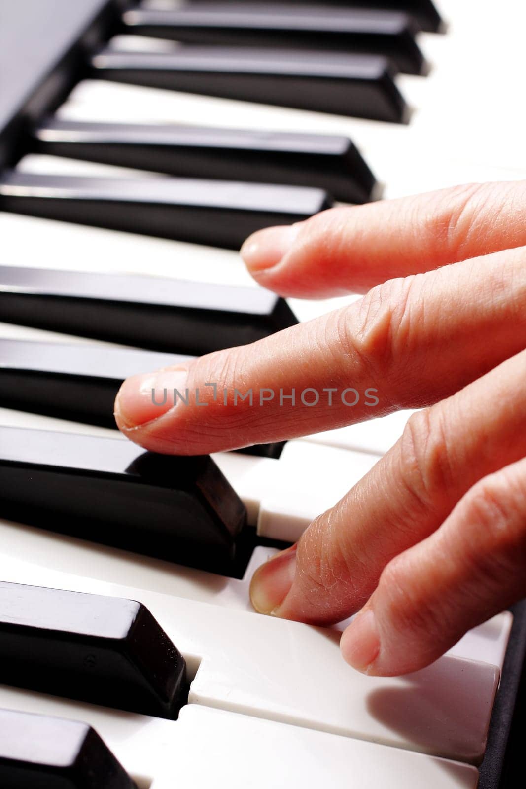 piano close up on the keyboard