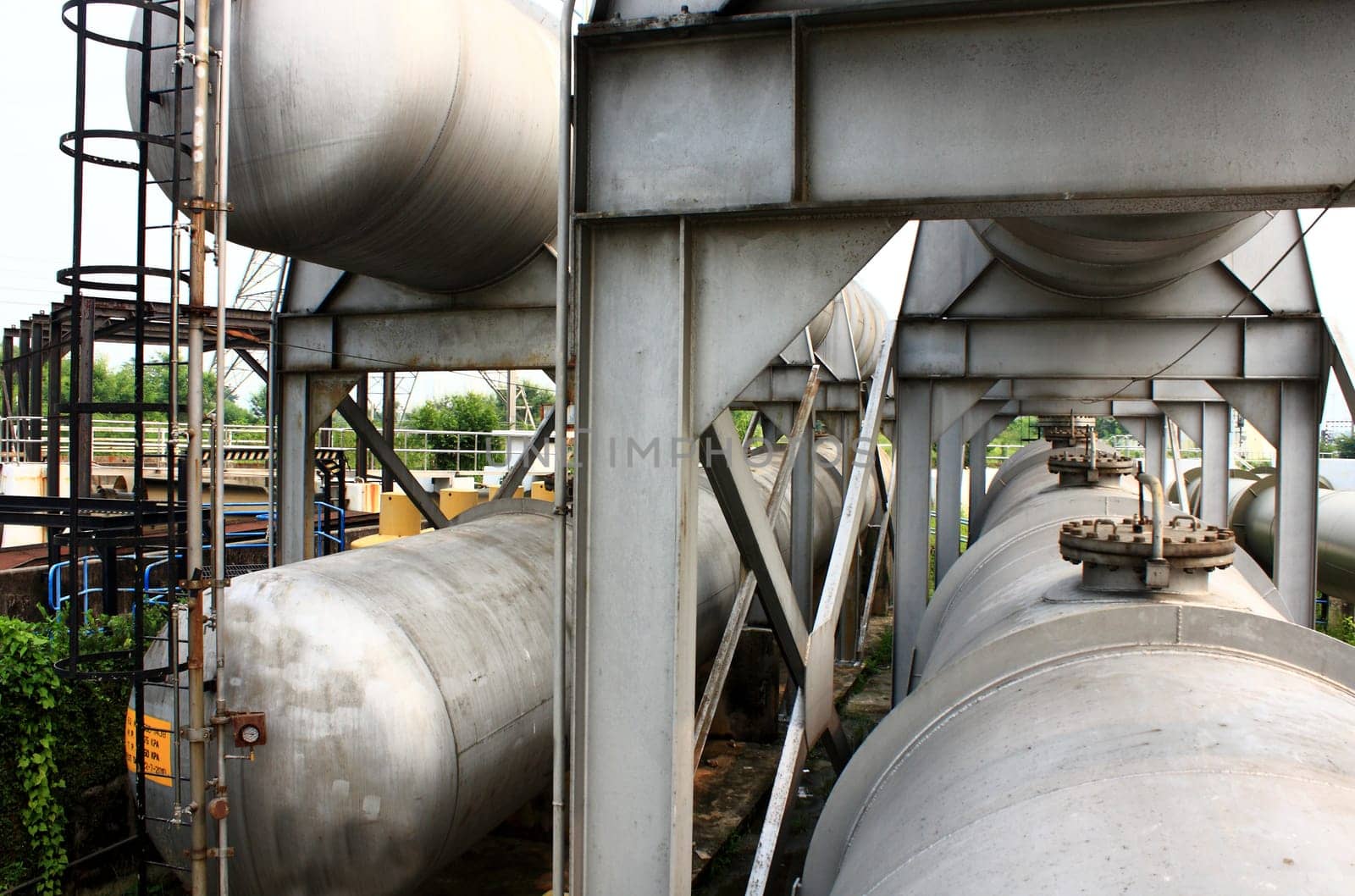 close up of gas storage tanks at day