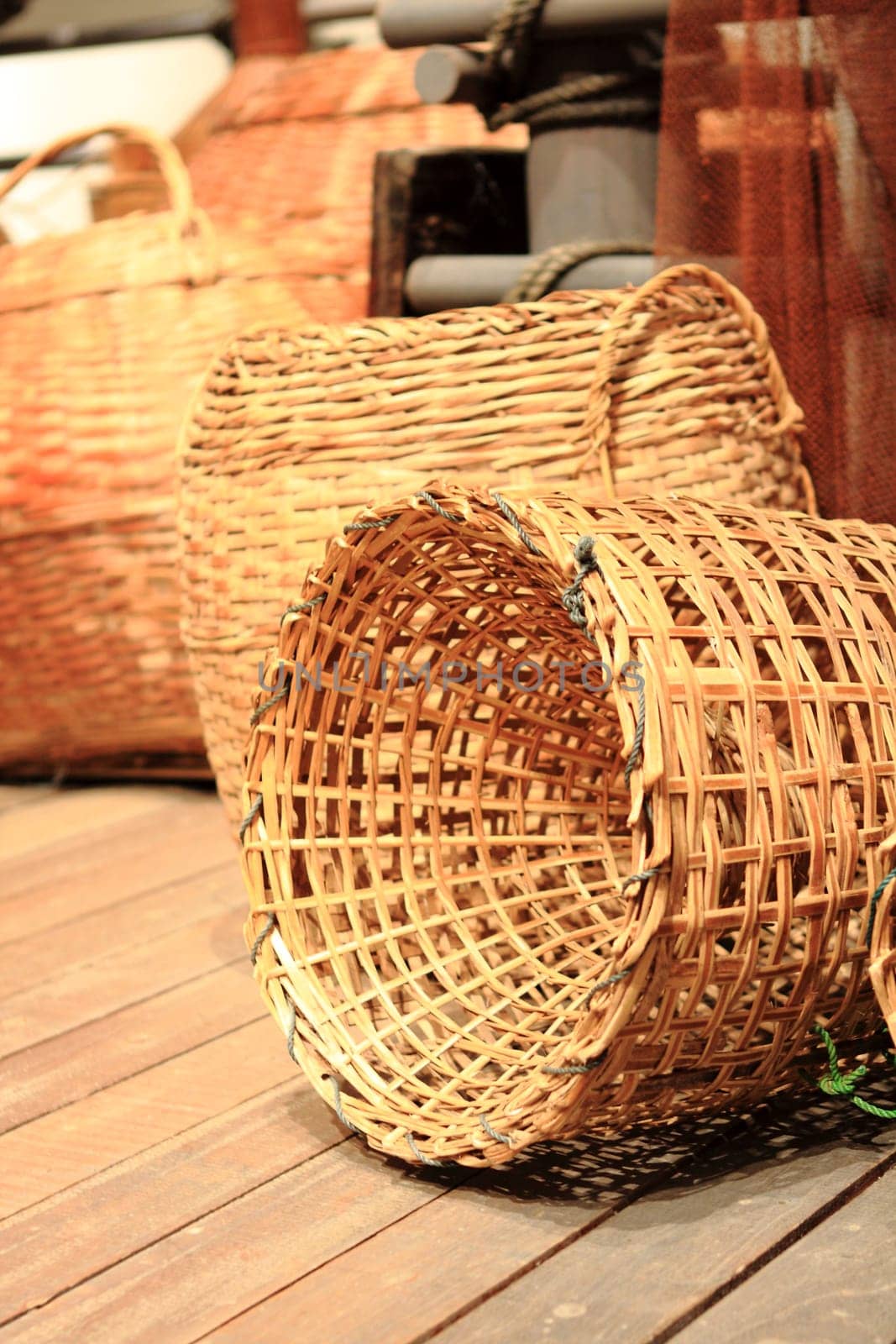 many yellow Wicker Basket  on the floor