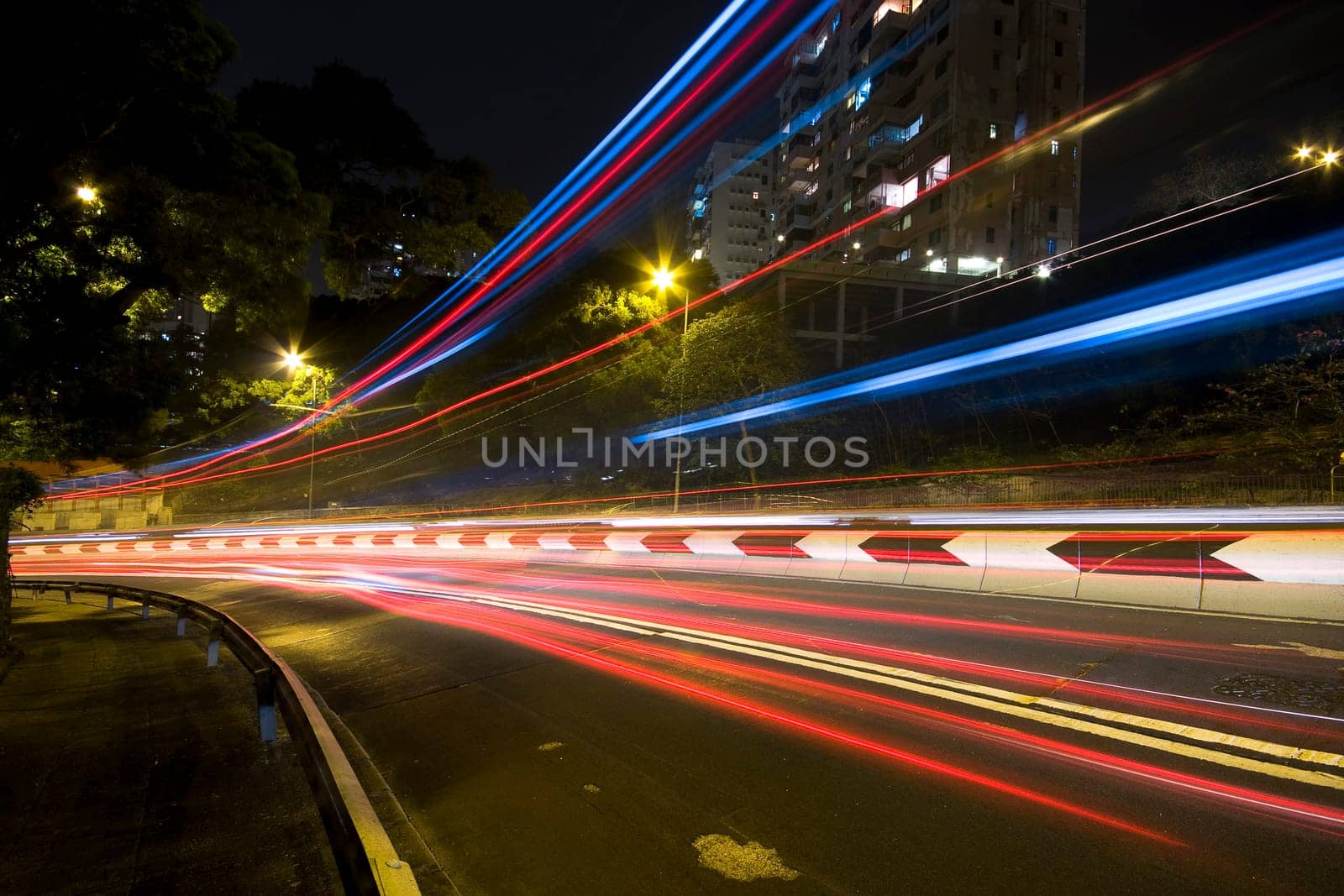 traffic in city at night in hong kong