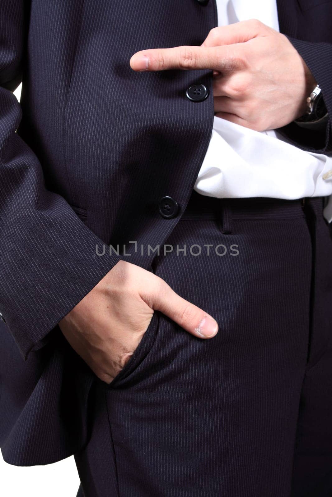 business man adjusting his suit