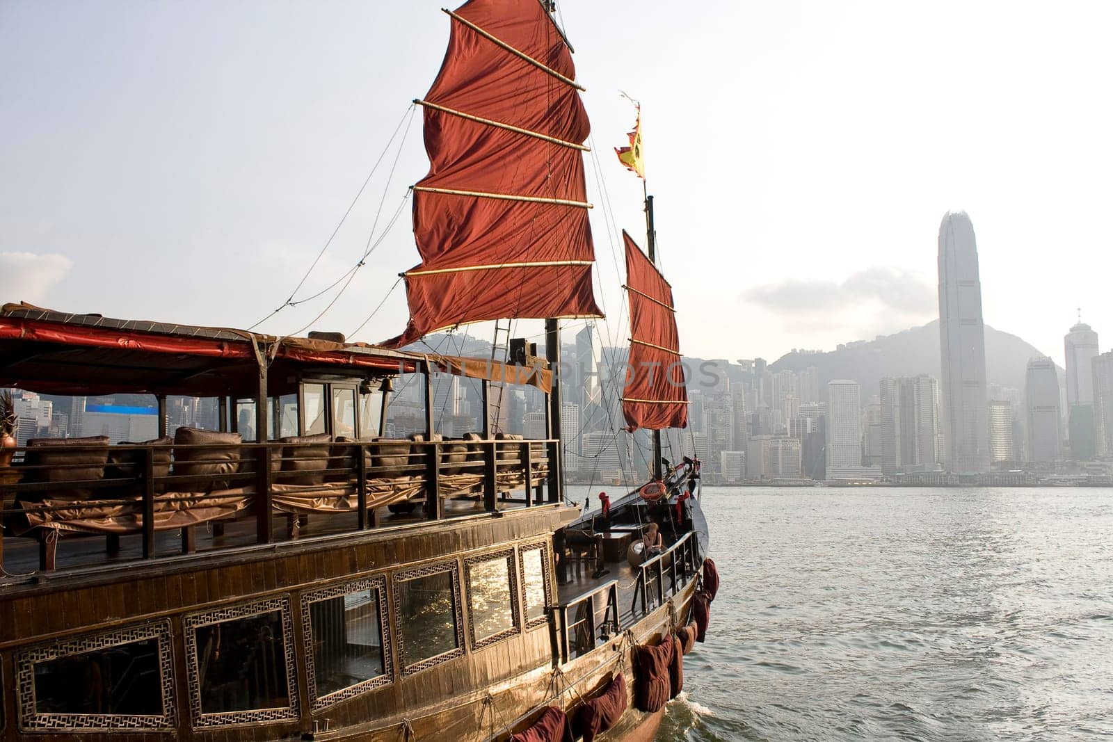 Traditional Chinese Boat on Victoria Harbour, Hong Kong at day